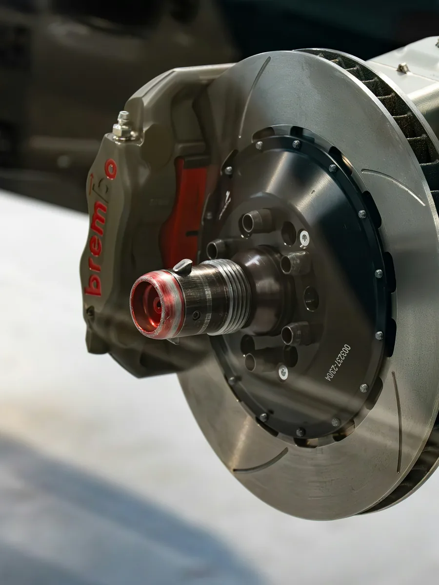 Two-piece brake disc and caliper assembled on a stand
